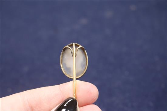 A 19th century yellow metal and sardonyx oval cameo stick pin, carved with the bust of Hermes to sinister, signed in Greek,